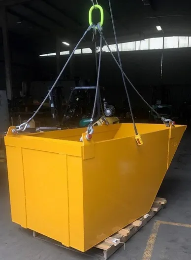 Shown here is a Custom Skip Pan Container with tapered end Complete with rigging